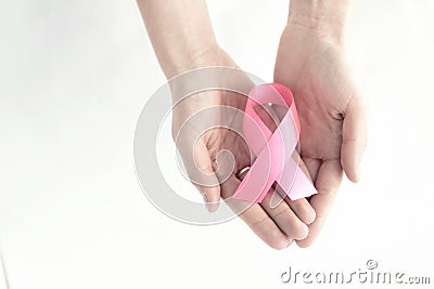 Hands with pink ribbon Stock Photo