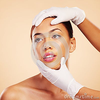 Hands, plastic surgery or facelift for woman in studio ready for laser, filler implant or beauty transformation Stock Photo