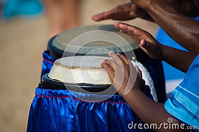 Hands playing atabaque. musical rhythm. African music Stock Photo