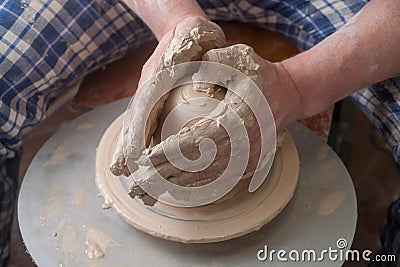 Hands of a potter Stock Photo