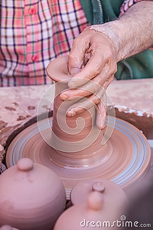 Molding clay with hands Stock Photo