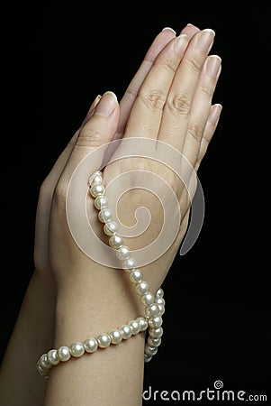 Hands In Prayer With Pearls Royalty Free Stock Image 