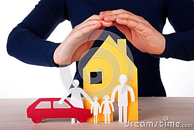 Hands Protecting House, Family and Car Stock Photo