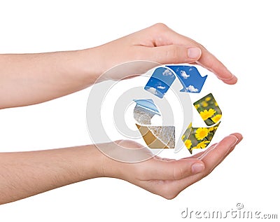 Hands protecting the recycling symbol Stock Photo