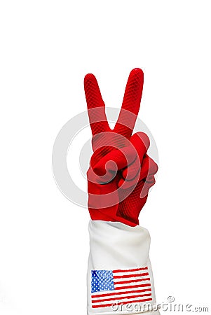 Hands in red rubber gloves with a USA flag on it making two fingers , on white background. everything is cool sign. concept world Stock Photo