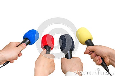 Hands of reporters with many microphones Stock Photo