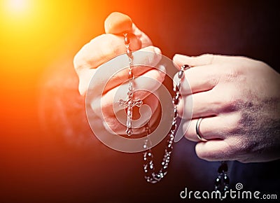 Hands and rosary Stock Photo