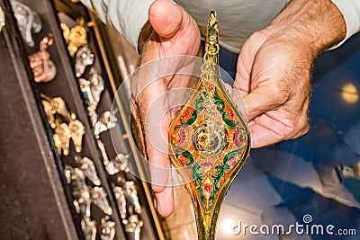 Hands rubbing on alladin lamp Stock Photo