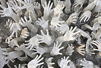 Hands sculpture at Wat Rong Khun temple, Thailand Stock Photo