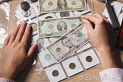 Hands with a set of dollars in the pockets Stock Photo