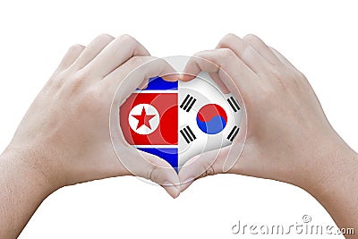 Hands in the shape of heart with symbols of the flag of north an Stock Photo