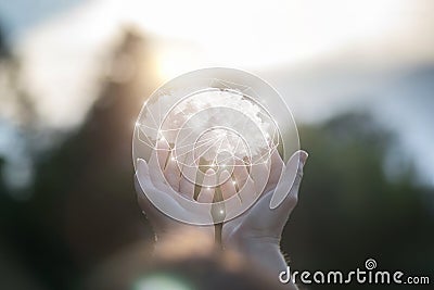 Hands show a brain consisting of clouds Stock Photo