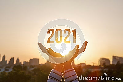 Show New Year 2021 against the background of the sun Stock Photo