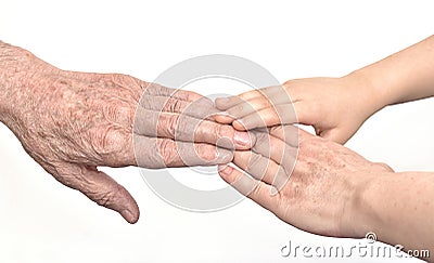 Hands of three generations Stock Photo