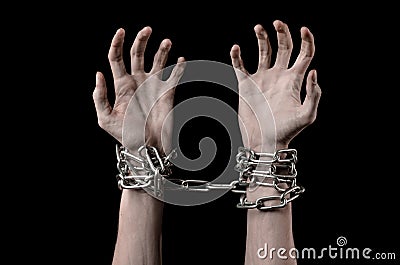 Hands tied chain, kidnapping, dependence, loneliness, social problem, halloween theme, black background Stock Photo