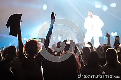 Hands to the skies of people dancing Editorial Stock Photo