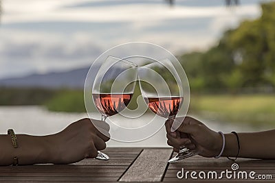 Hands toasting wine Stock Photo