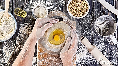Hands working with dough preparation recipe bread, pizza or pie making ingridients, food flat lay on kitchen table background Stock Photo