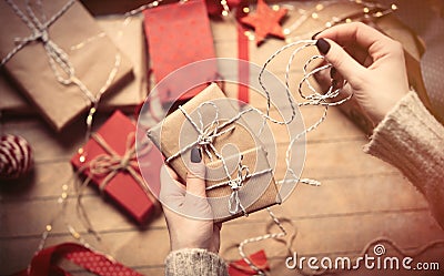 Hands wrapping gifts Stock Photo