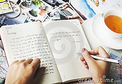 Hands Writing Journal Tea Concept Stock Photo