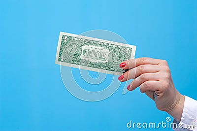 Hands of a young unidentified woman dollar banknote Stock Photo