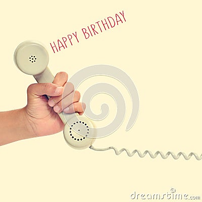 handset of a retro telephone and text happy birthday, with a retro effect Stock Photo