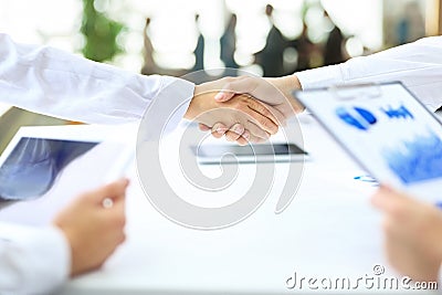 Handshake business partners after the conclusion of successful c Stock Photo