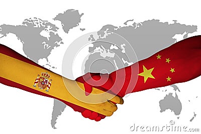 Handshake between China and Spain, nation flag on hand Stock Photo