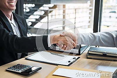 Handshake after finishing conversation Businessman sending a resignation letter to employer boss in order to resign dismiss Stock Photo