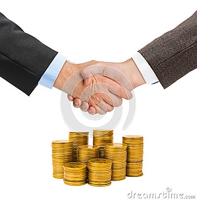 Handshake and gold coins Stock Photo