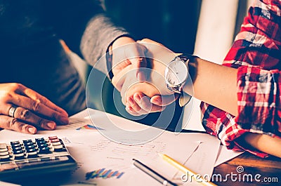 Handshake between joint venture businessmans Stock Photo