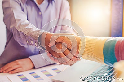 Handshake between joint venture businessmen Stock Photo