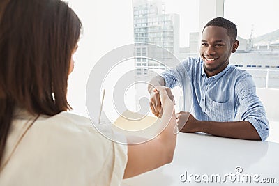 Handshake to seal a deal after a business meeting Stock Photo