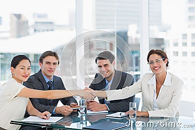 Handshake to seal a deal after a job recruitment meeting Stock Photo