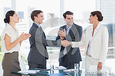 Handshake to seal a deal after a job recruitment meeting Stock Photo