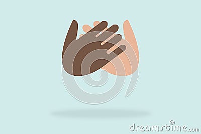 Handshake of black and white hand showing friendship and respect on light blue background Stock Photo