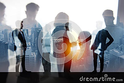 Handshaking business person in office. concept of teamwork and partnership. double exposure Stock Photo
