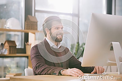 handsome architect working with computer in office Stock Photo