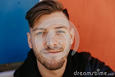Handsome Attractive Male Adult Person Model in Winter Autumn Season Head shots Face Up Close Expression Portraits Vivid Colors Stock Photo