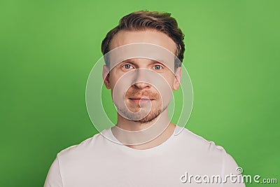 Handsome blond positive confident business man look camera isolated on green color background Stock Photo