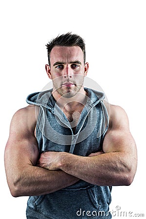 Handsome bodybuilder with arms crossed Stock Photo