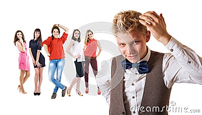 Handsome boy portrait with group of pretty girls Stock Photo