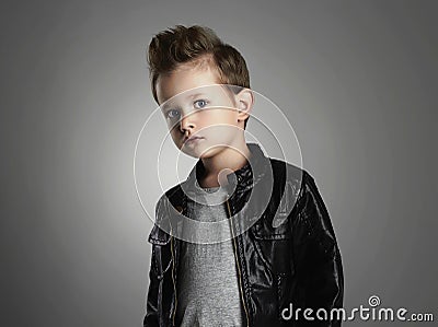 Handsome boy with trendy hairstyle.Fashionable child in leather coat Stock Photo