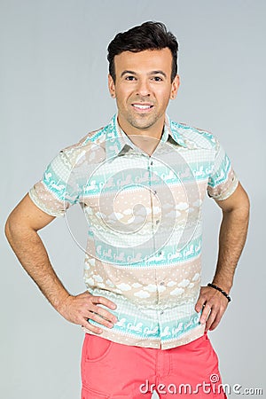 Handsome brazilian male wears colorful summer shirt. 30s. Stock Photo