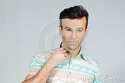 Handsome brazilian male wears colorful summer shirt. 30s. Stock Photo