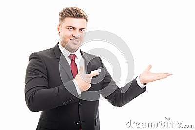 Handsome business man pointing copyspace area Stock Photo