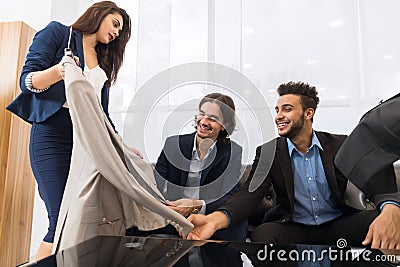 Handsome Business Man And Woman Fashion Shop, Customers Choosing Clothes In Retail Store Stock Photo
