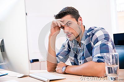 Handsome businessman in casual cloth and headphones Stock Photo