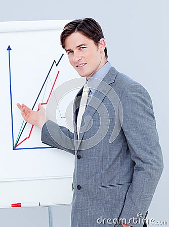 Handsome businessman reporting sales figures Stock Photo