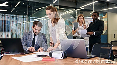 Businessman signing bussiness partnership agreement. Focused male on putting signature, concluding official contract on Stock Photo